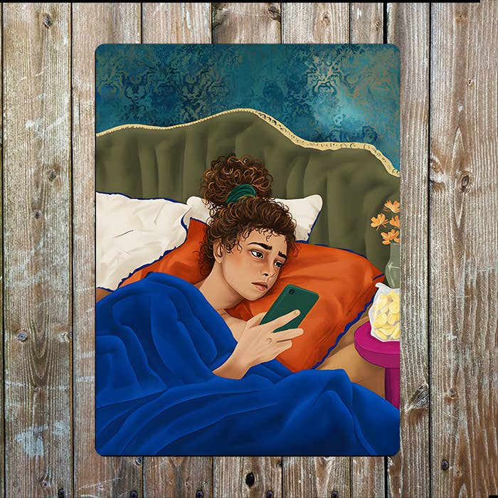 A Person In Bed On Their Phone | Metal Sign Plaque