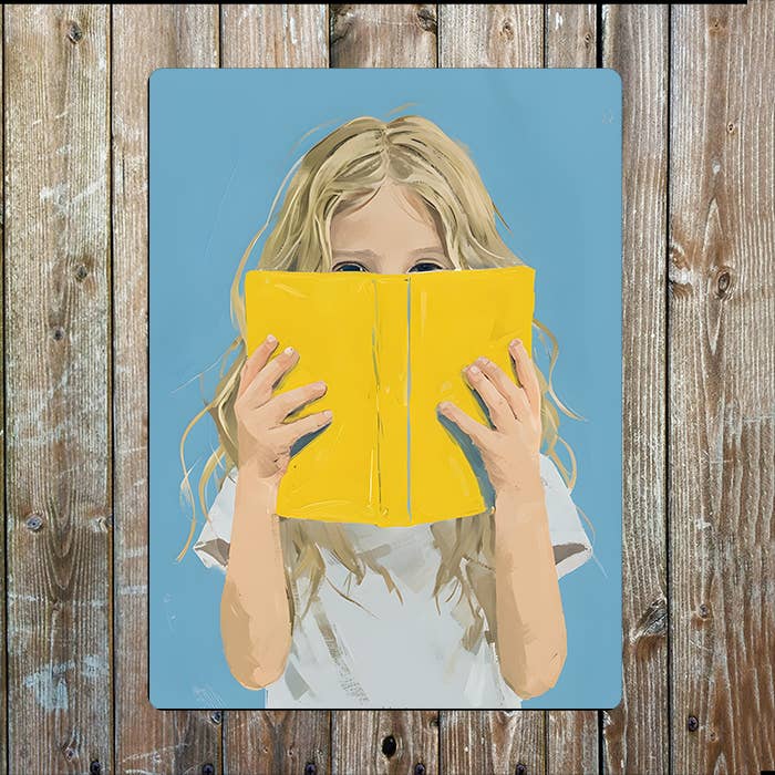 Girl Child Holding Yellow Book | Metal Sign Plaque