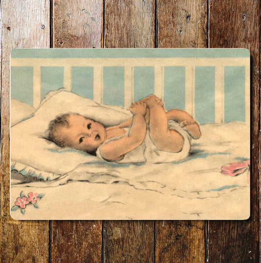 Baby Smiling In Crib Blue | Metal Sign Plaque