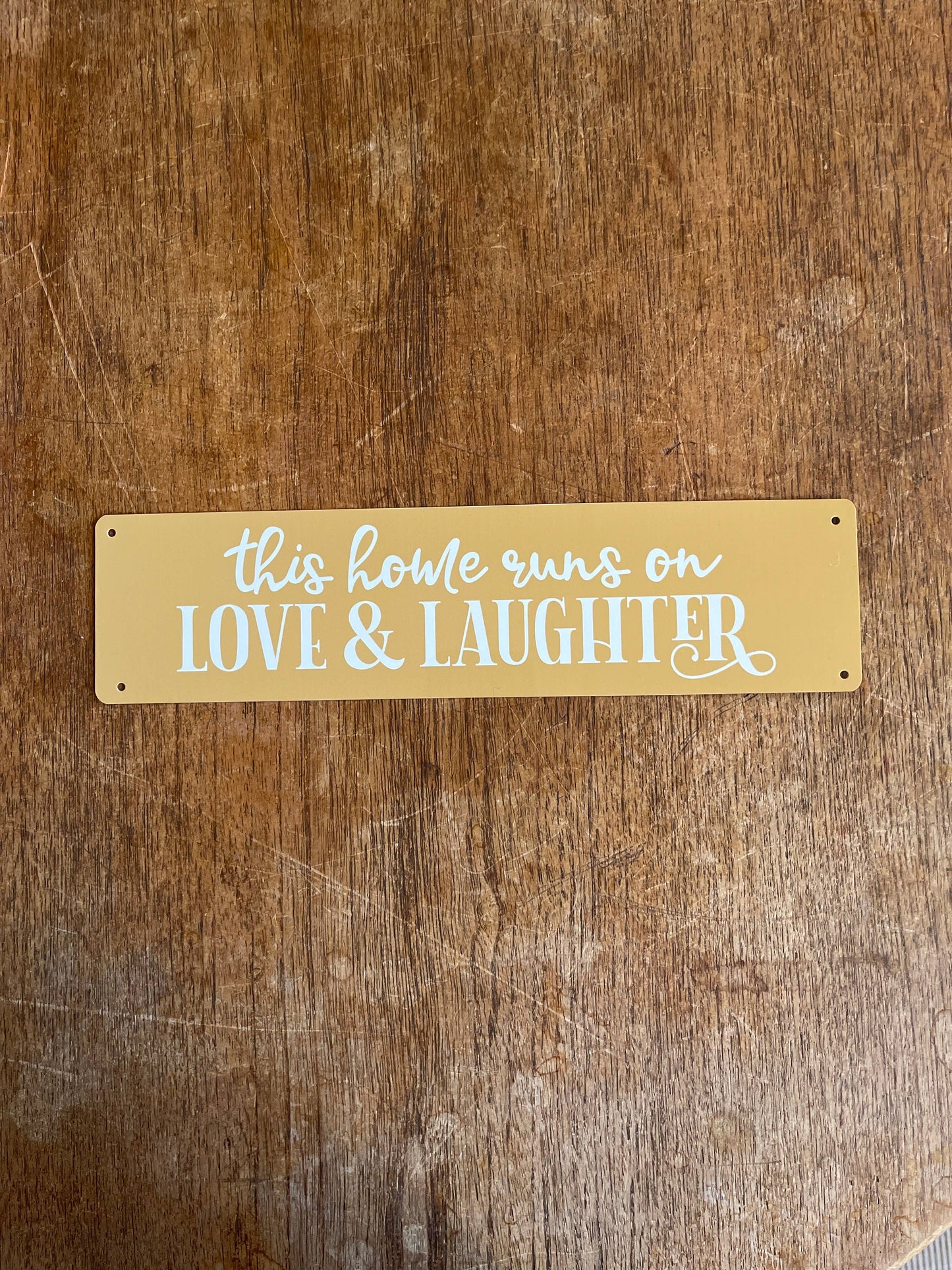 This home runs on Love and Laughter quote Metal Sign Plaque