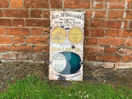 Head Light Oil 24 | Metal Wall Sign