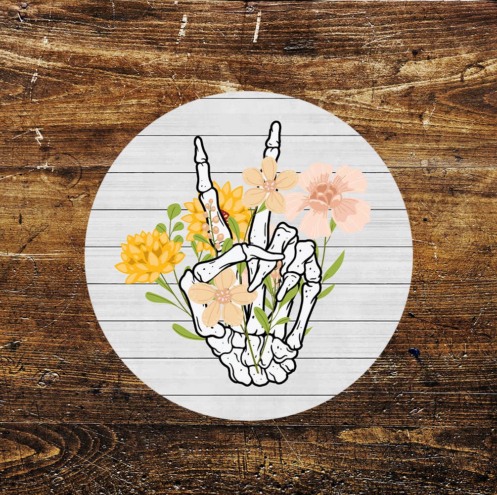 Skeleton Hand Holding Yellow Flowers Circle Metal Sign