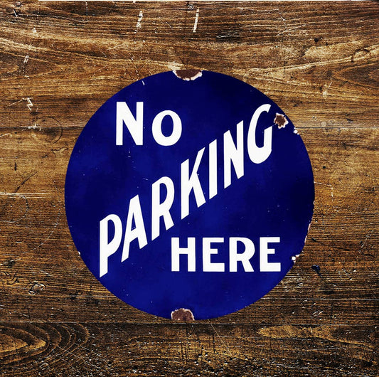 No Parking Here Circle Metal Sign