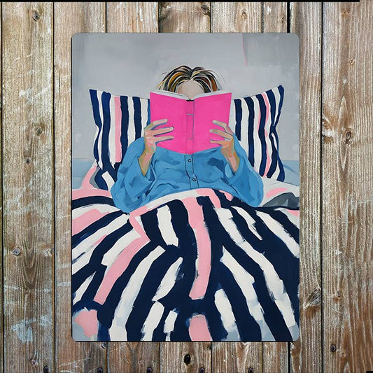 Women Reading A Pink Book In Bed | Metal Sign Plaque