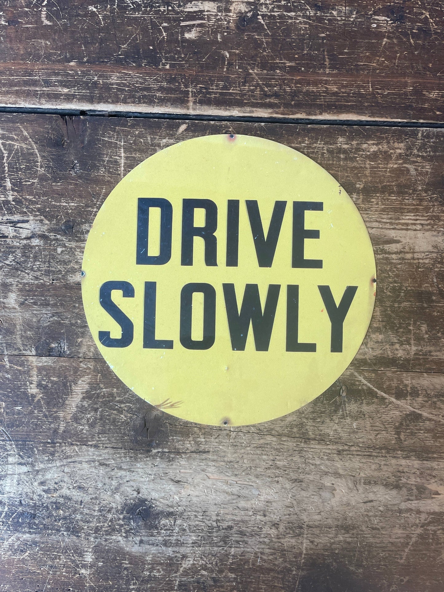 Drive Slowly Car Circle Metal Sign