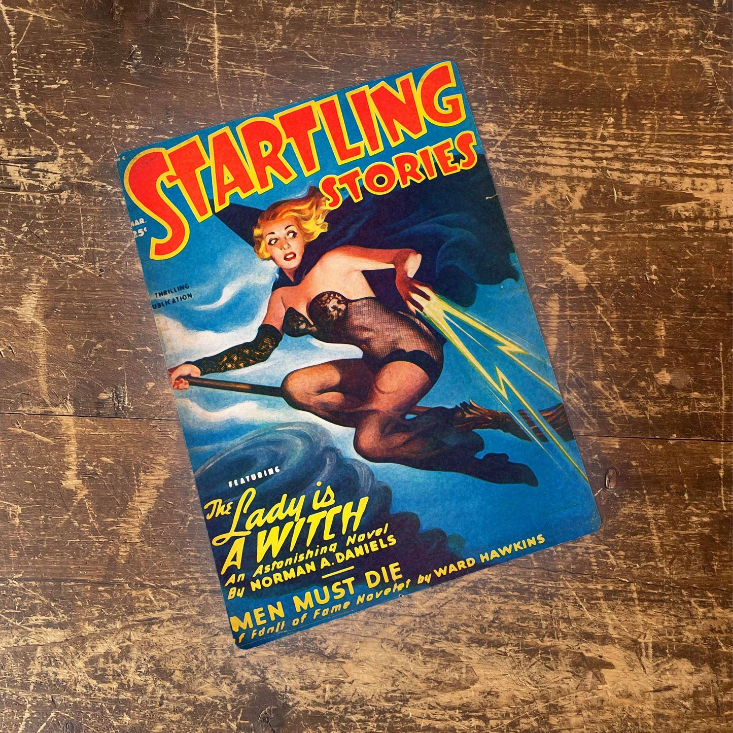 Startling Stories Pinup Girl Witch Broom Metal Sign