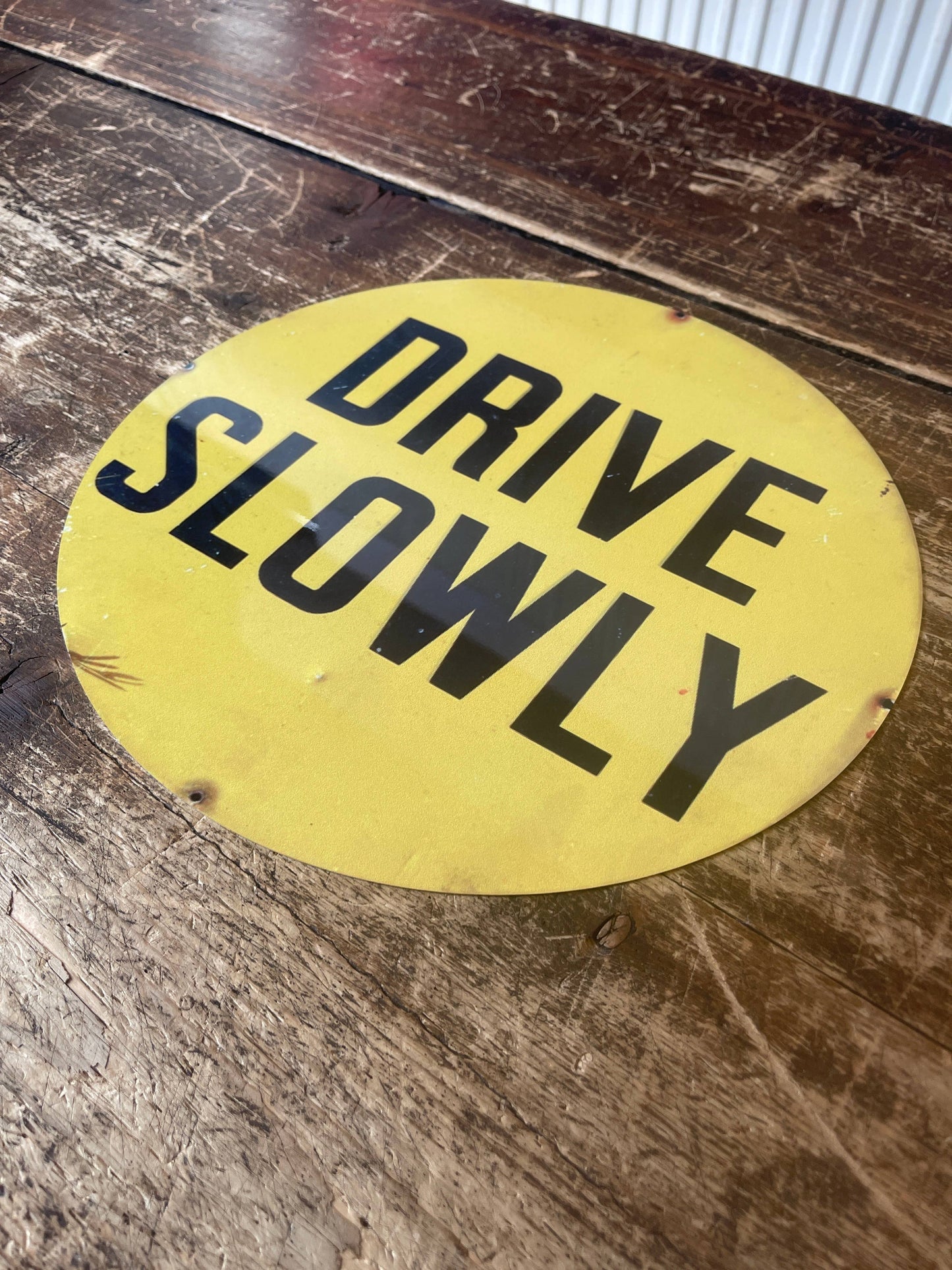 Drive Slowly Car Circle Metal Sign